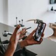 unrecognizable ethnic woman disputing with boyfriend during video call